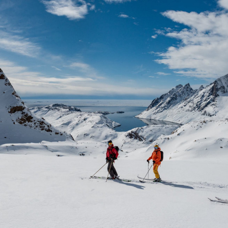 A wonderful day of heli-skiing in Greenland with majestic glaciers, mountains and the ocean below. ©Eli Spiegel