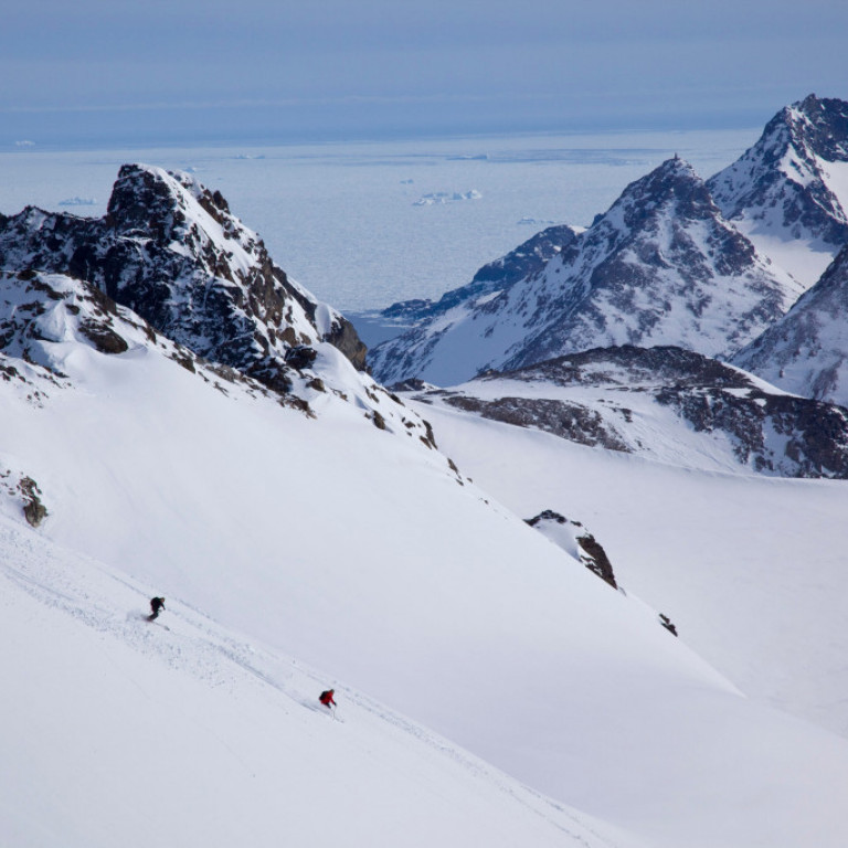 Following your trusty heli ski guide towards the waters edge on fantastic snow on the East Coast of Greenland is what Greenland heliskiing is all about.