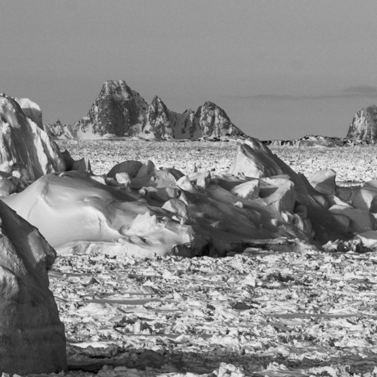 Towering icebergs and frozen fjords is what you can expect to see every day on your East Greenland Heli-skiing adventure. Amazing views and vistas all around.  ©Eli Spiegel