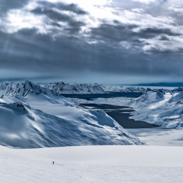 Heli-skiing endless terrain right above the fjords on the east coast of Greenland. Incredible heliskiing terrain as far as the eye can see is truly Greenland. ©Eli Spiegel