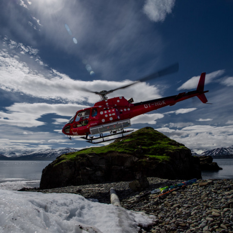 Helicopter flying over one of our sea level pick-up spots ©Brittany Mumma
