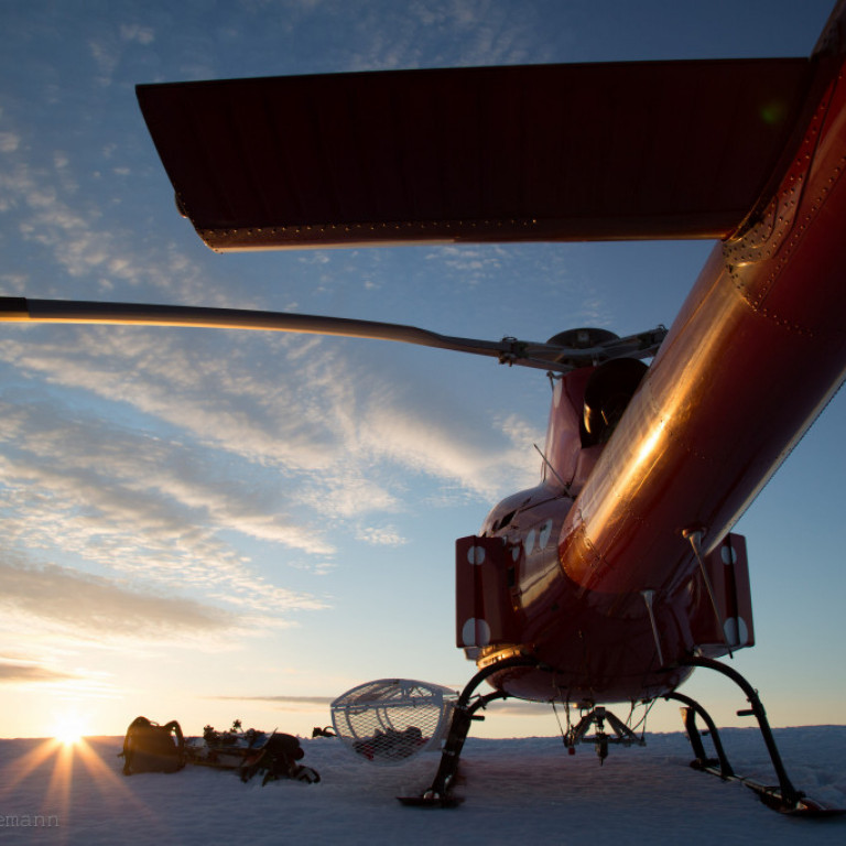 Helicopter in the glow of the midnight sun ©Colleen Gentemann