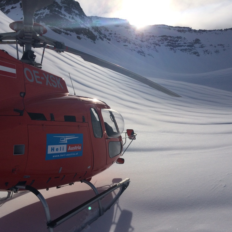 Helicopter in the valley bottom to pick up a group