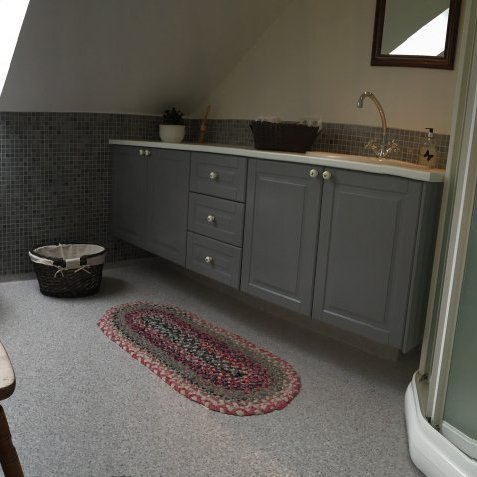 Bathroom on upper floor with shower