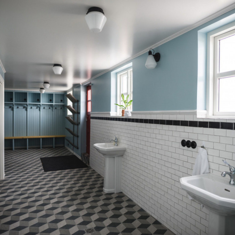 Lower lever with 2 toilets, 2 showers, washer/dryer and gear area, including boot dryer