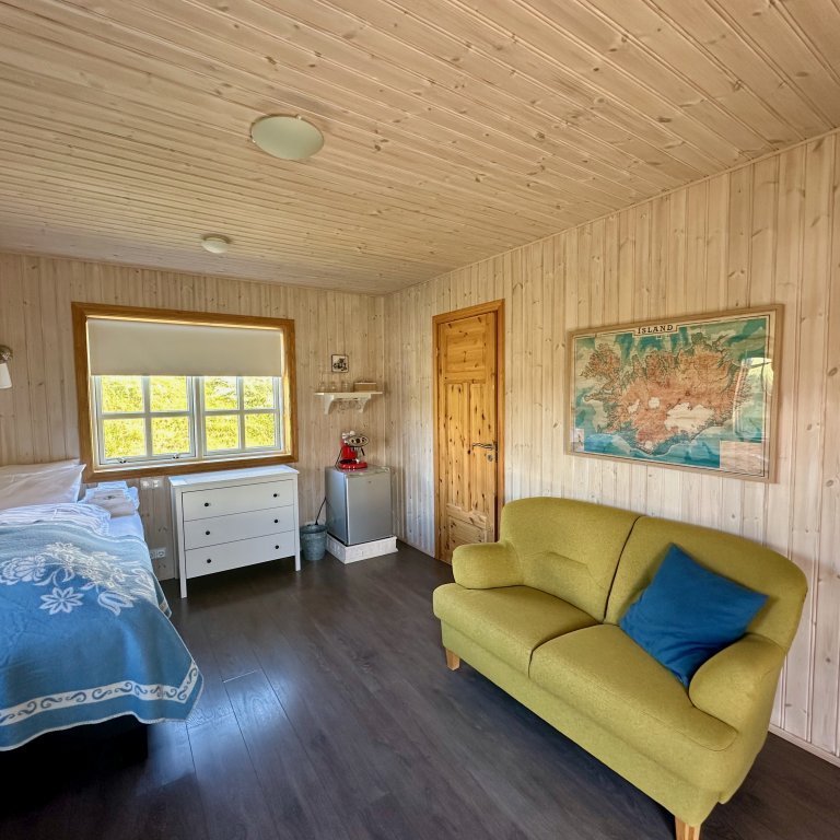 Main floor of guest apartment. 120cm bed for 1 guest. Bathroom on the main floor.