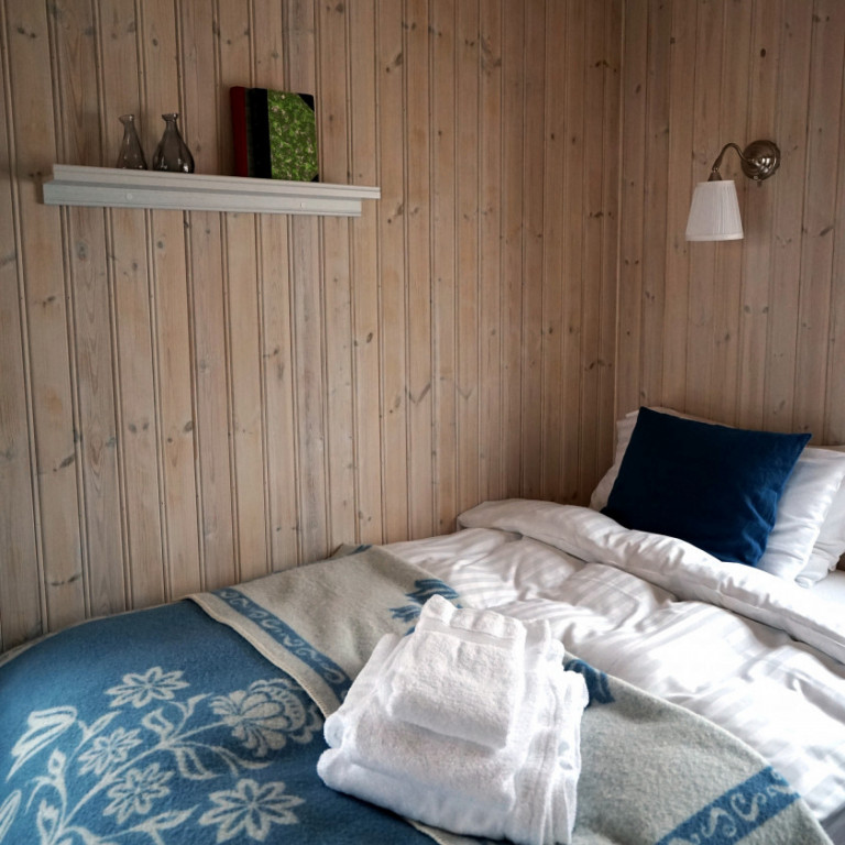 Single bed on ground floor of apartment (2 apartments per cabin)