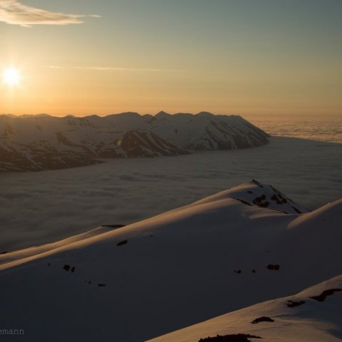 Heli Skiing in the Midnight Sun with Arctic Heli Skiing. ©Colleen Gentemann