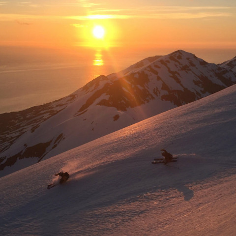 Skiing in the Midnight Sun with Arctic Heli Skiing