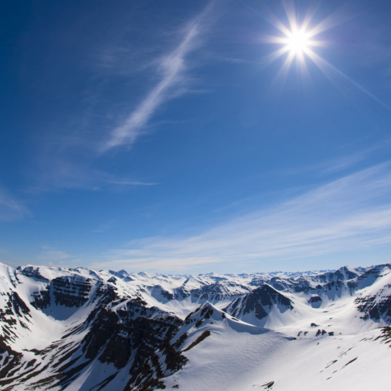 Ski lines as far as the eye can see on a bluebird day in Iceland ©Grant Gunderson